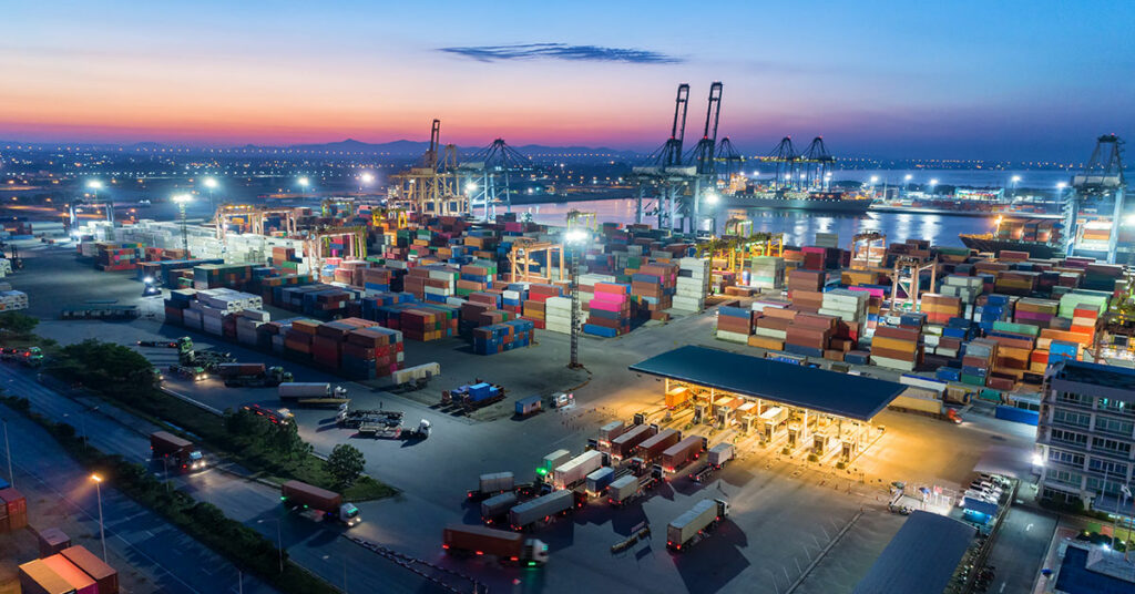 A port facility showcases how containers are outsourced from different parts of the world for the supply chain management process.